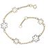 Foto de 10-00-7737 - PULSERA FLORES BICOLOR 9-7MM 18.5CM (1,94gr) 18K
